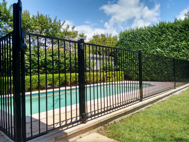 Standard flat top powder coated aluminium pool fencing. 16mm diameter verticals. 50mm square posts.
